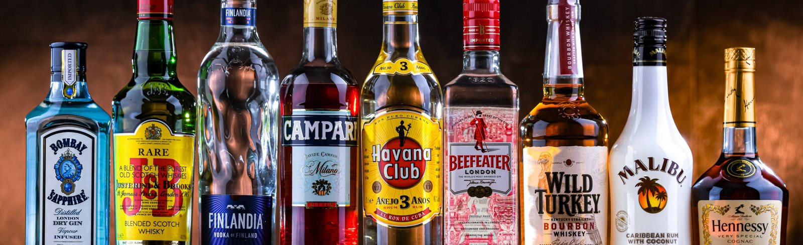 POZNAN, POL - APR 10, 2025: Bottles of popular global liquor brands